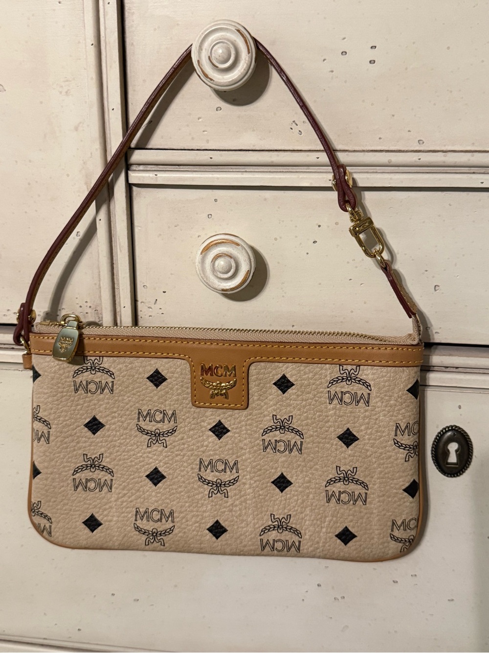 MCM Beige Logo Wristlet with Brown Trim and Gold Hardware